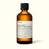 Front of an Aesop Post-Poo Drops amber bottle.