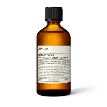 Front of an Aesop Post-Poo Drops amber bottle.