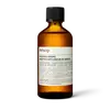 Front of an Aesop Post-Poo Drops amber bottle.