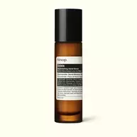 Solais Replenishing Hand Serum in a glass bottle.