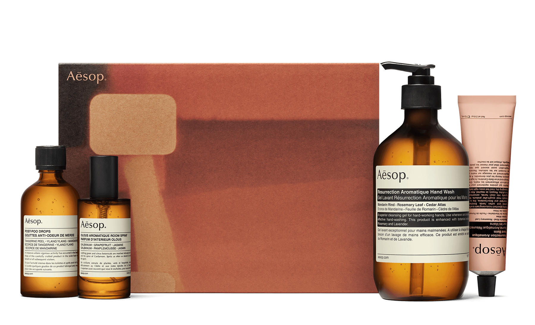 Four formulations alongside a recycled cardboard gift box. 