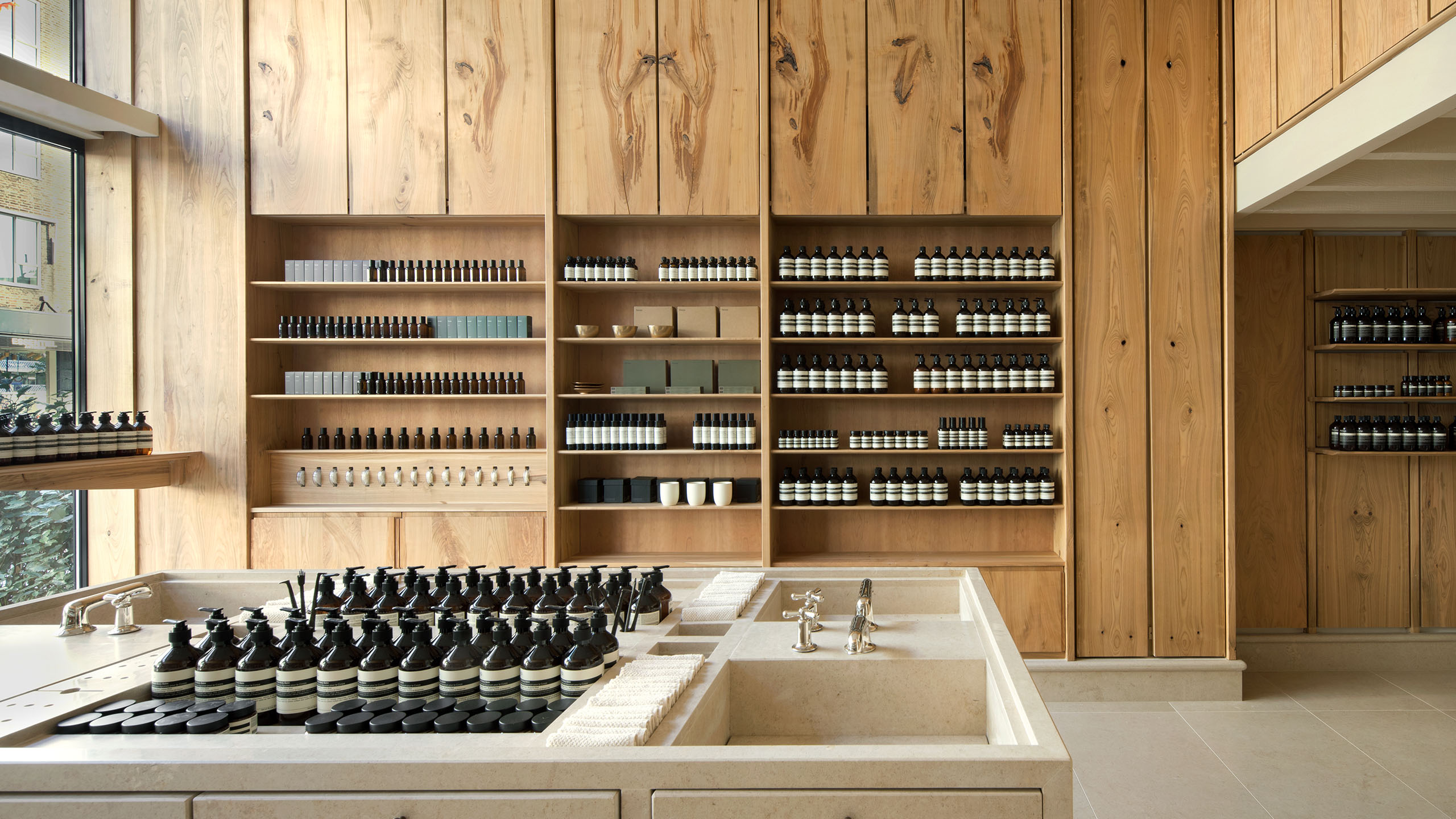 Aesop De Meent store interior basin and shelving display units featuring Aesop product.