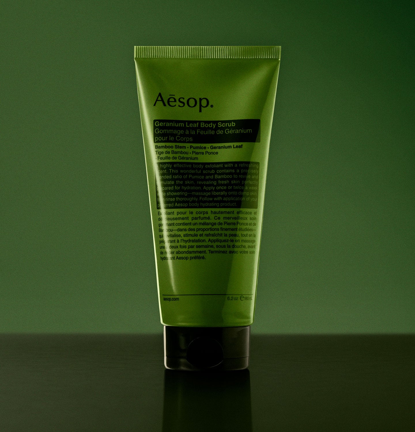 Geranium leaf body scrub placed in front of green background