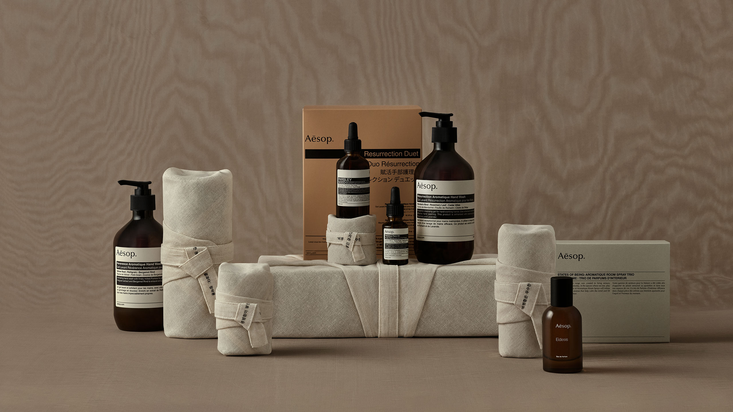 Aesop products next to bojagi gift wrapping cloth