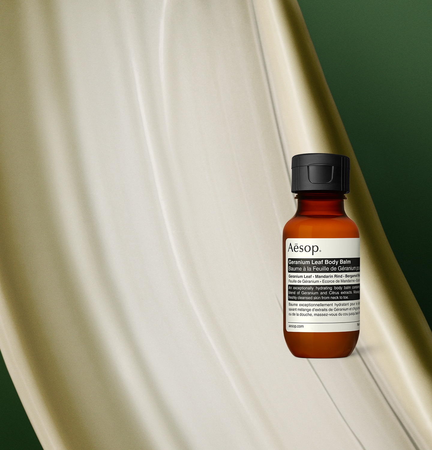 Geranium Leaf Body Balm displayed against a backdrop of its texture.