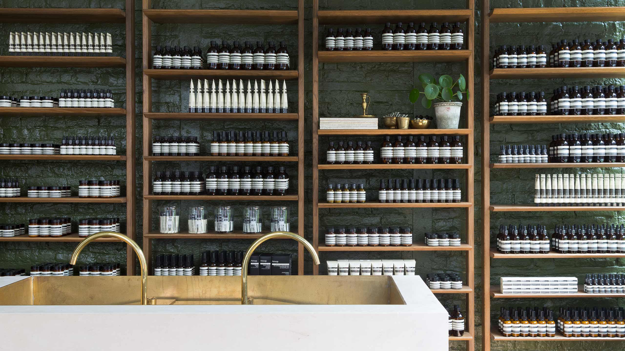 Aesop Vieux Lille store interior basin detail and shelving displaying products