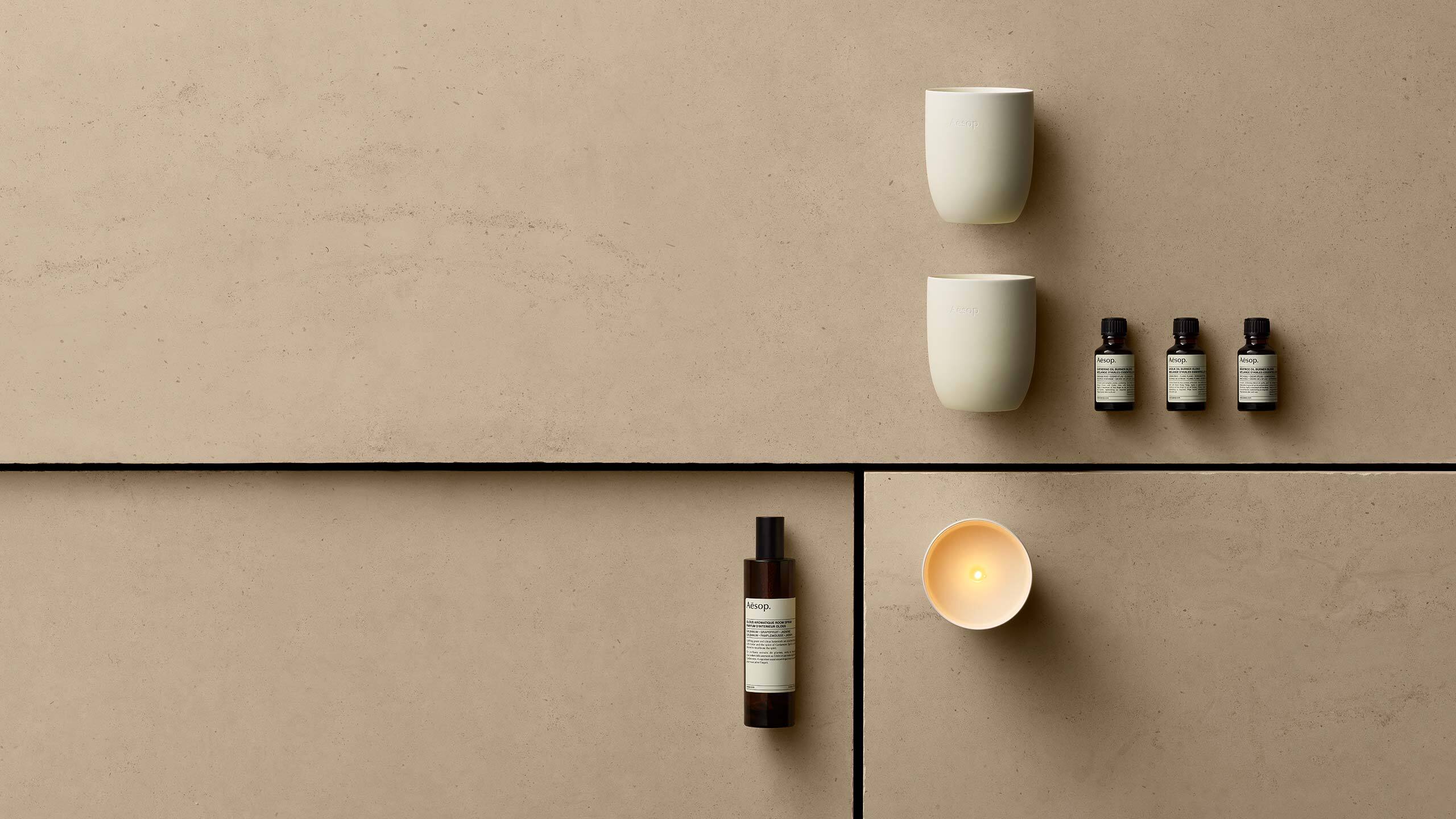 Aesop products with beige cement background