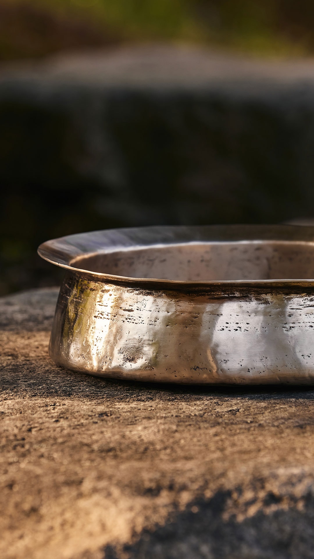 Bangjja bronzeware displayed outdoors.