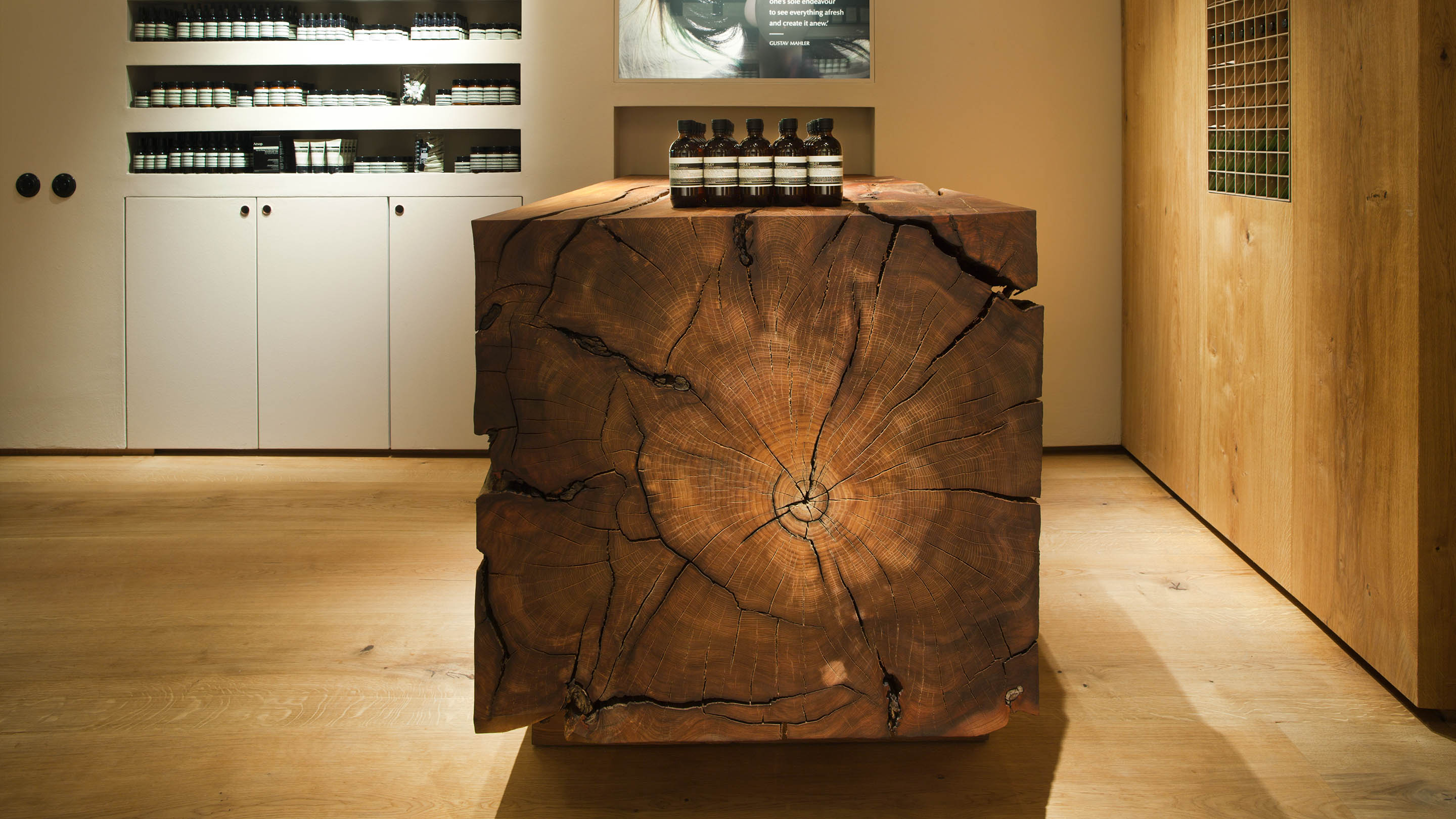 Aesop store, timber bench detail with products on top