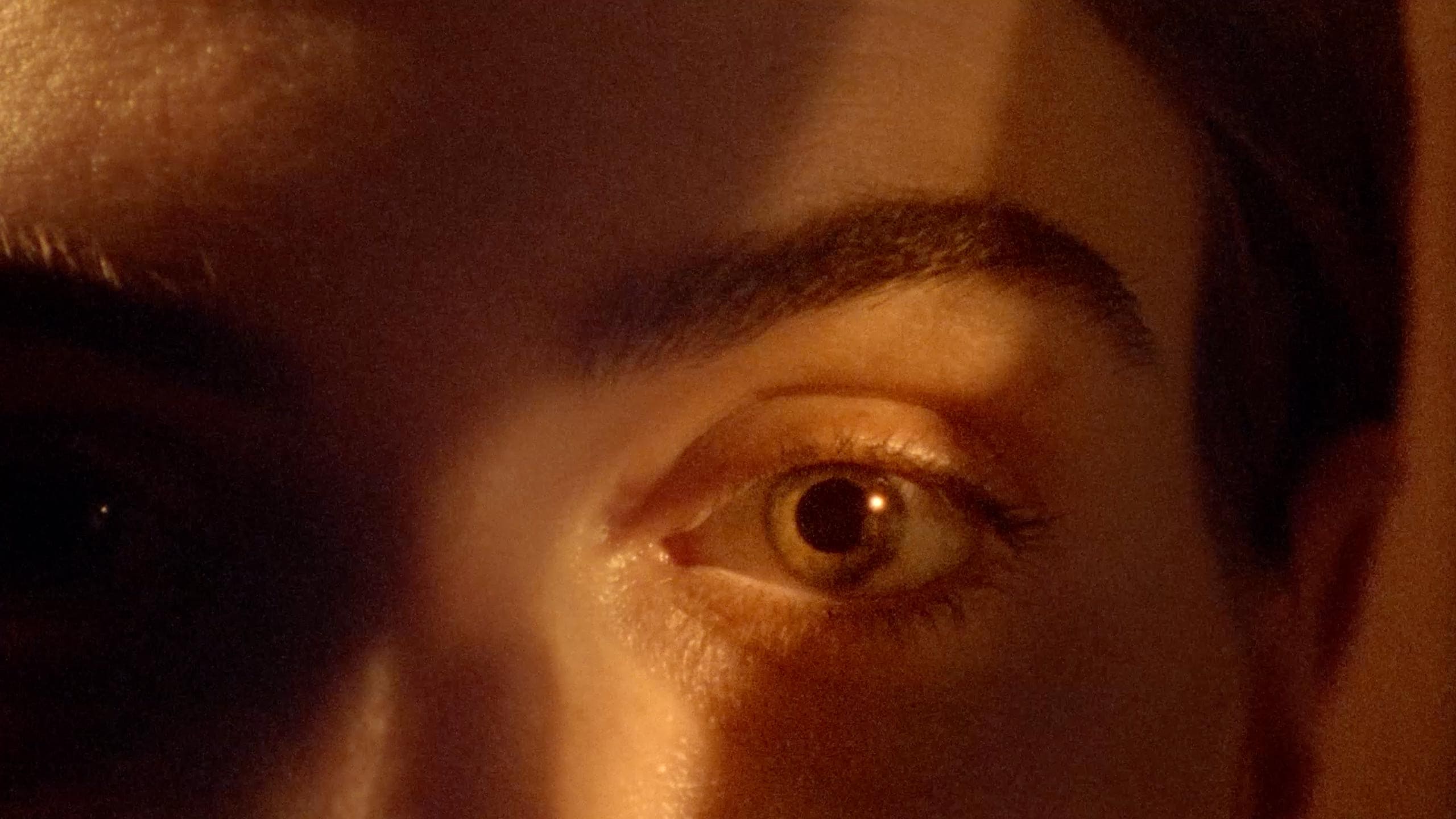 Light cast over a persons eye.