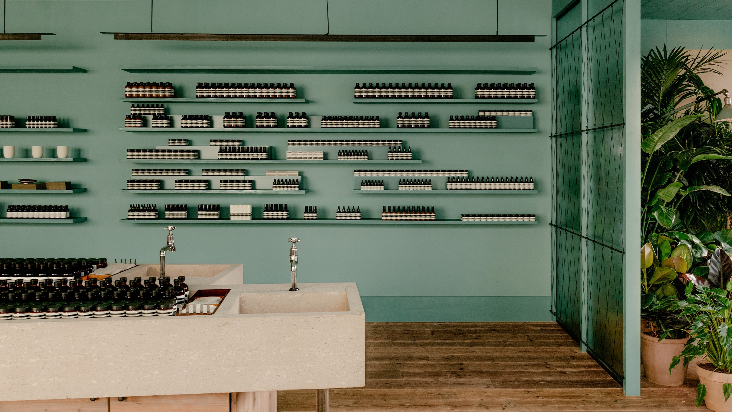 Aesop Richmond store interior basin and product shelve display.