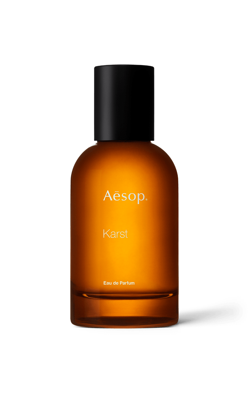 Karst Eau de Parfum in an Amber bottle.