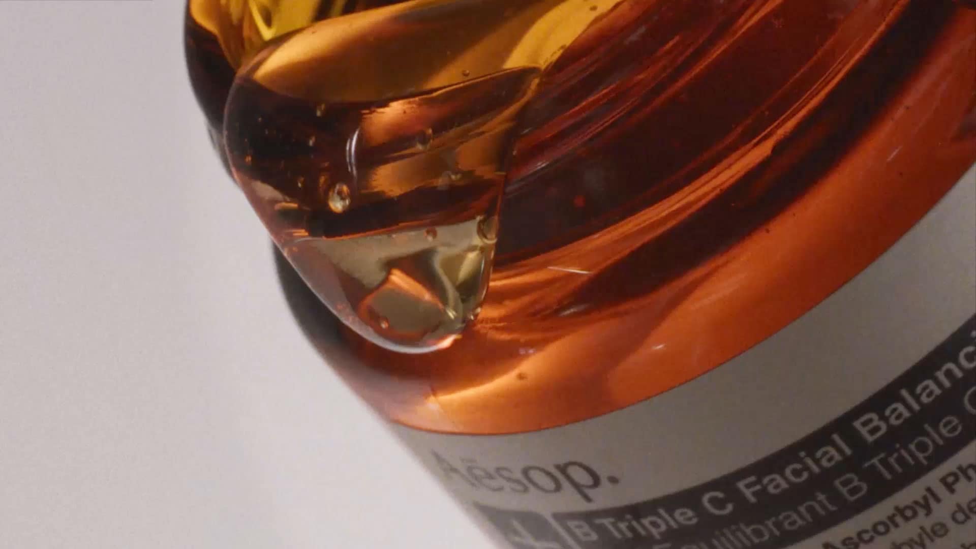 Jar of B Triple C Facial Balancing Gel being poured into a petri dish.