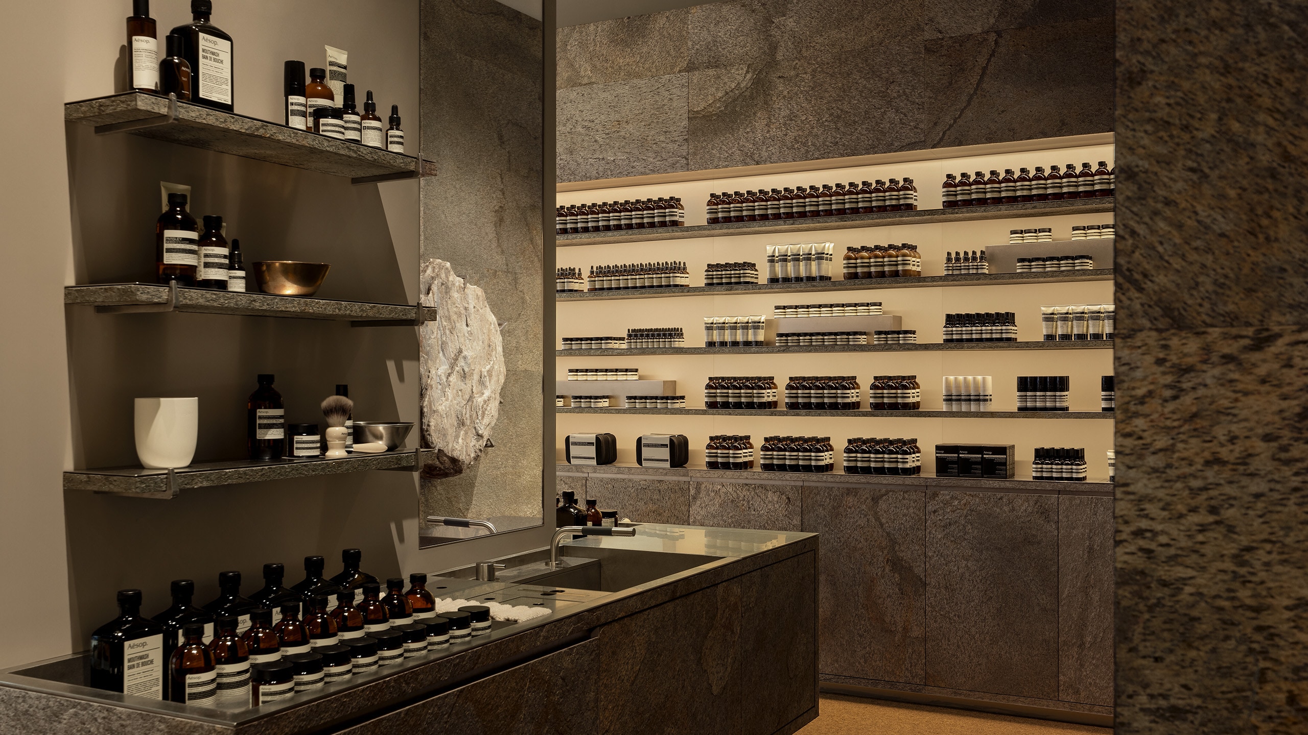 An individual ensuite behind the pillarour, surrounded by a full range of products for the skin, hair, body and home