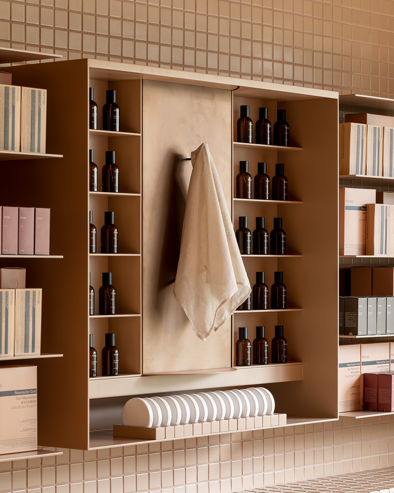 Eslite Xinyi store interior with towel and fragrance products display on the shelves