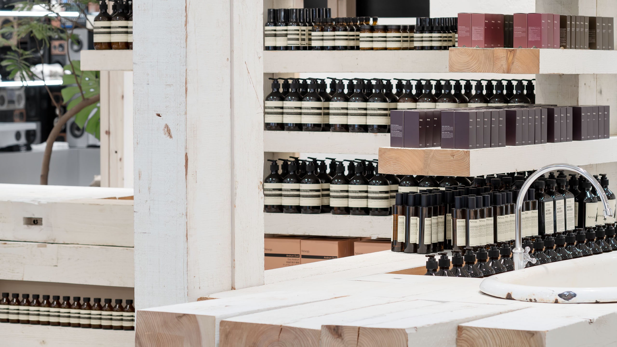 Aesop hankyu umeda 8F Interior, products line up at the store which has the term of 'A modular arrangement of repurposed timber'