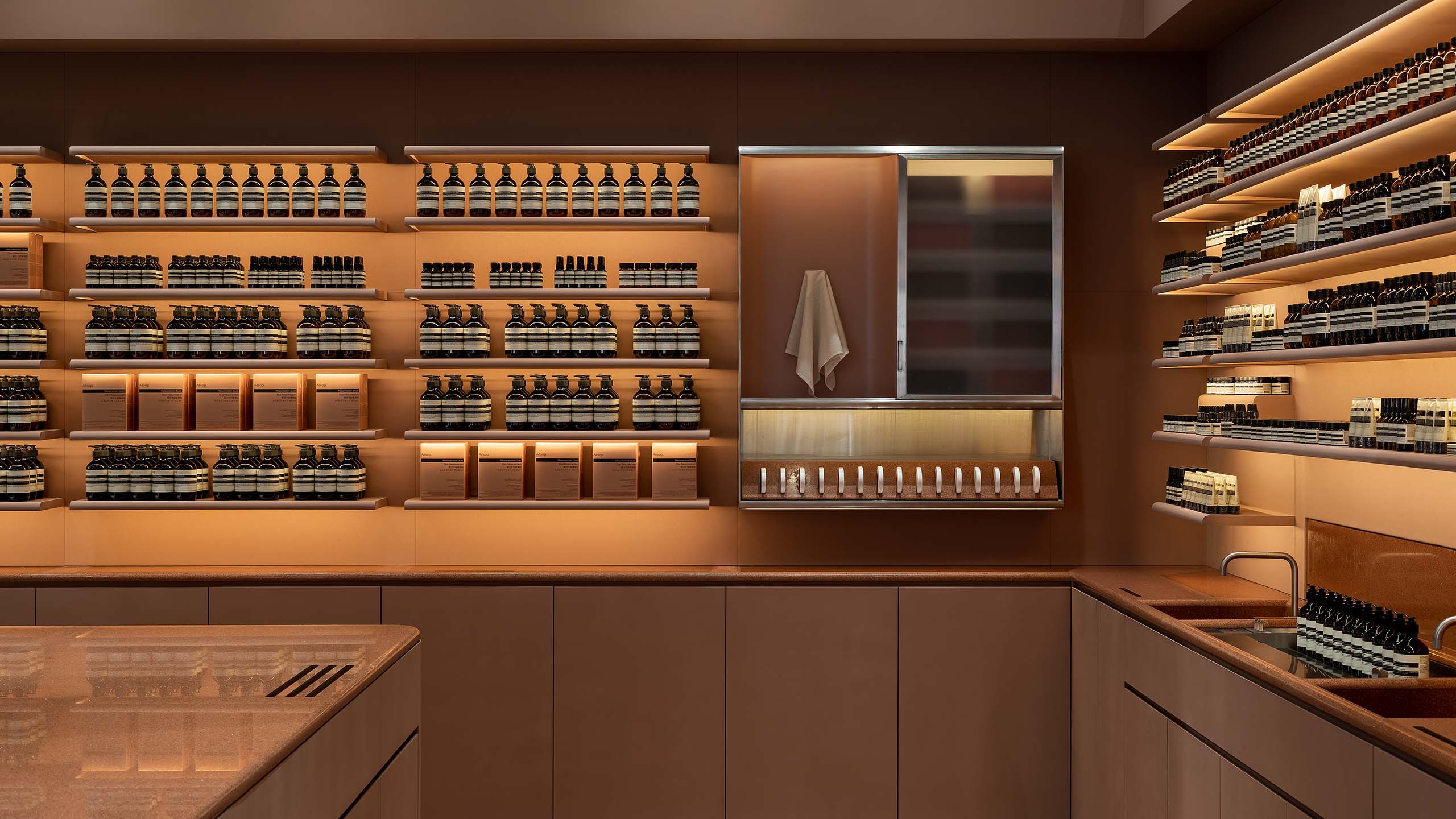 Aesop Hanshin Arena counter interior in dusty rose
