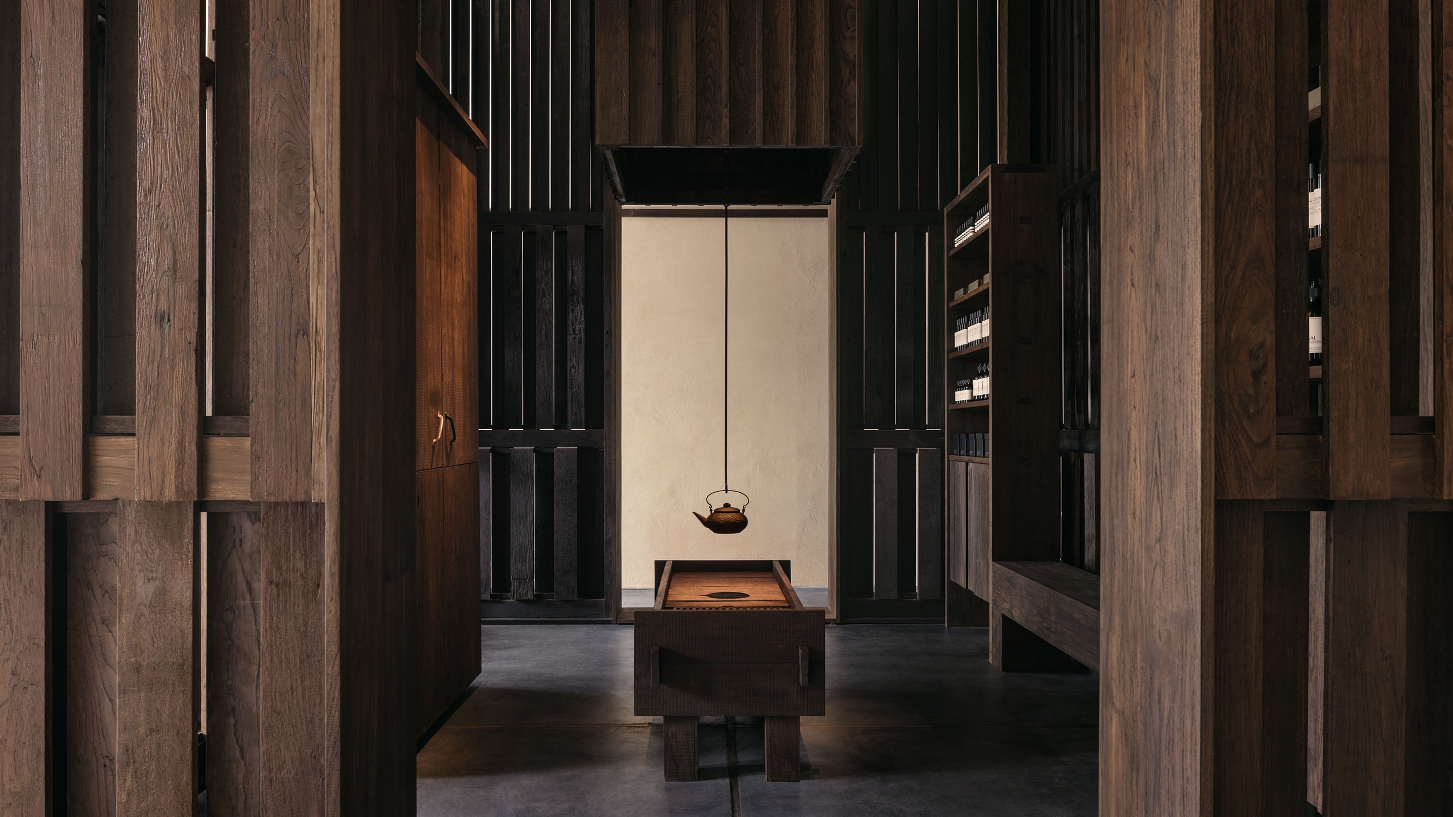 Aesop Thonglor store interior with wooden enclave of light and shadow