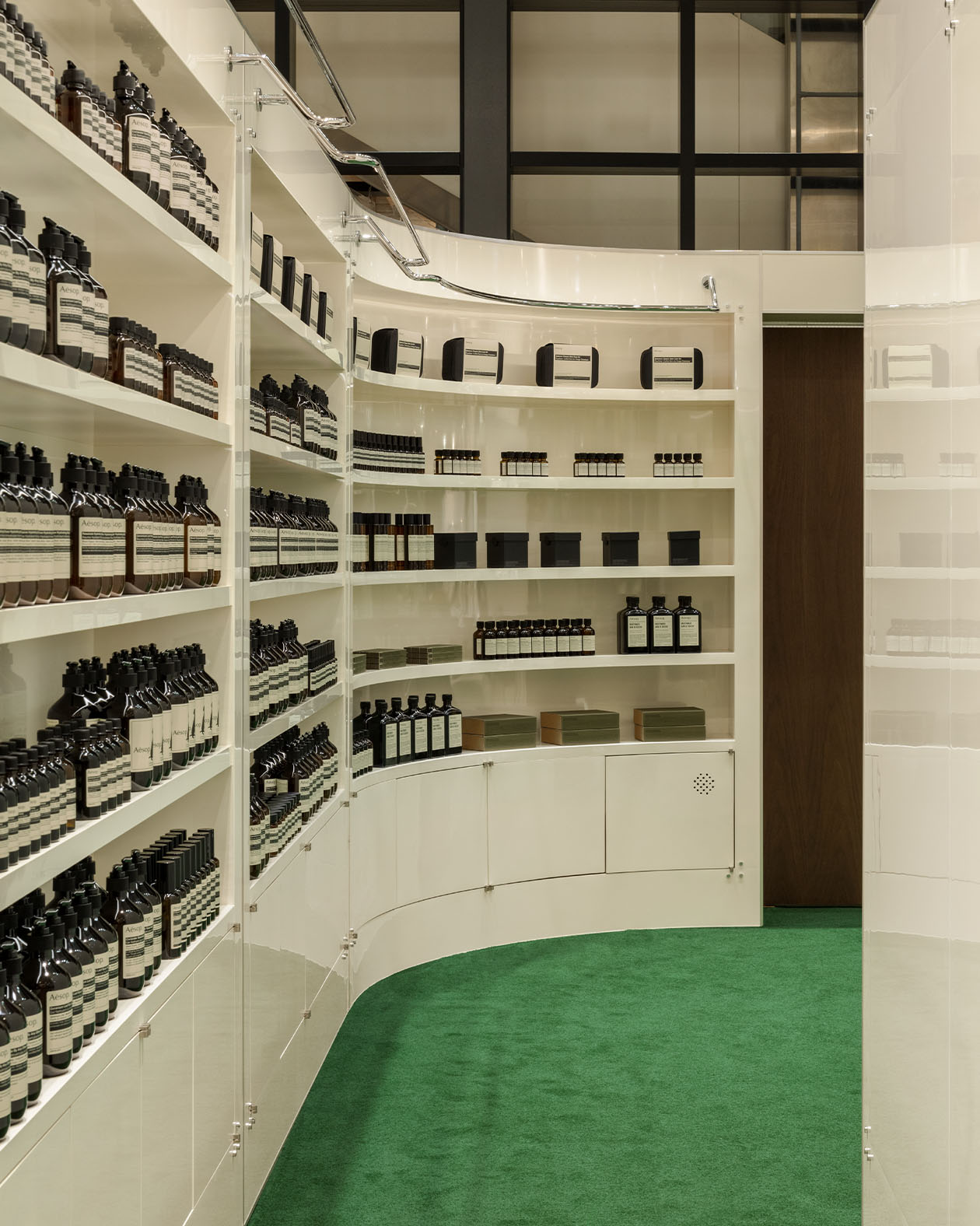 Aesop products showcase on the white cabinet