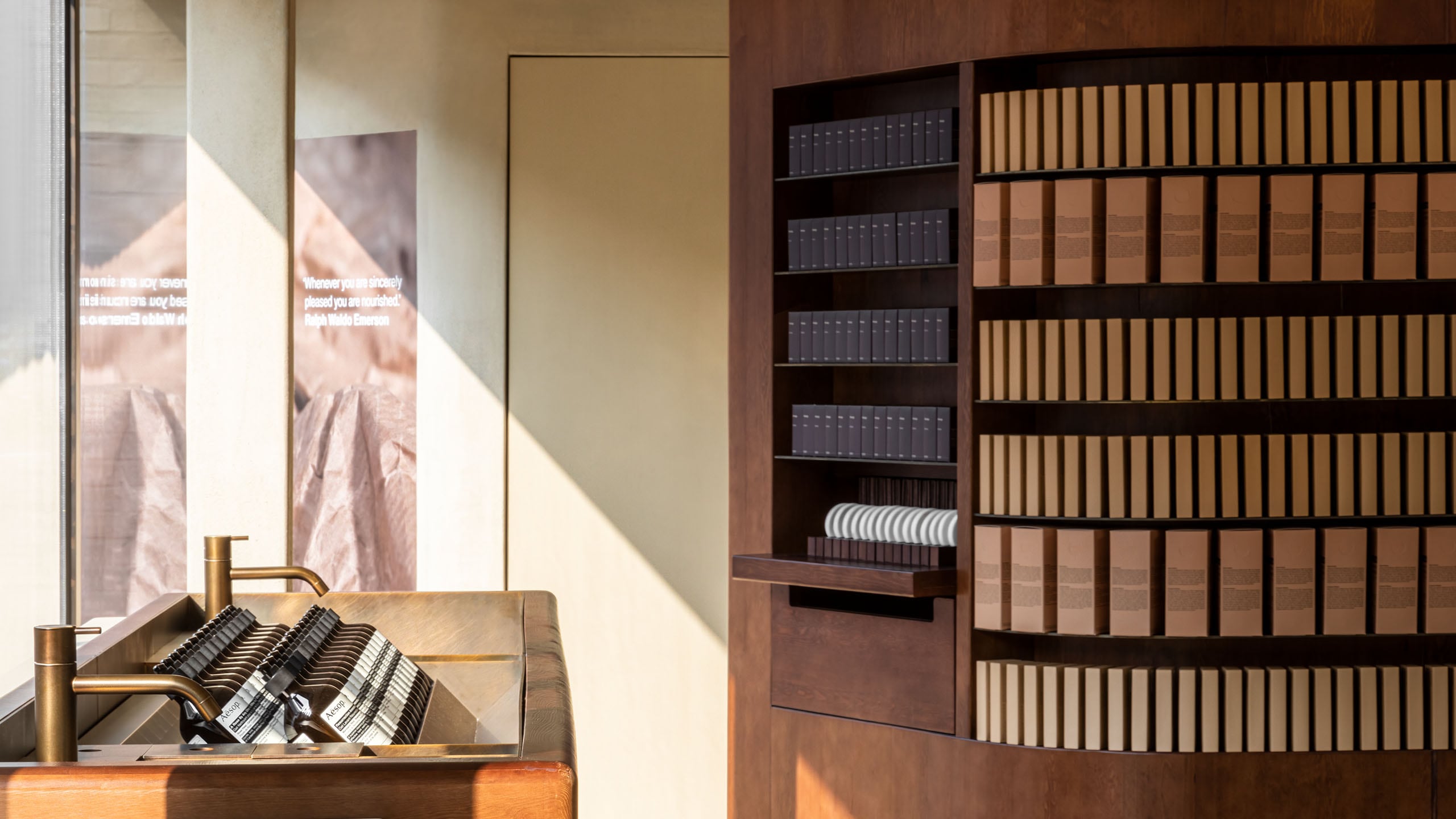 Light shining through over the basins at Aesop Seongsu