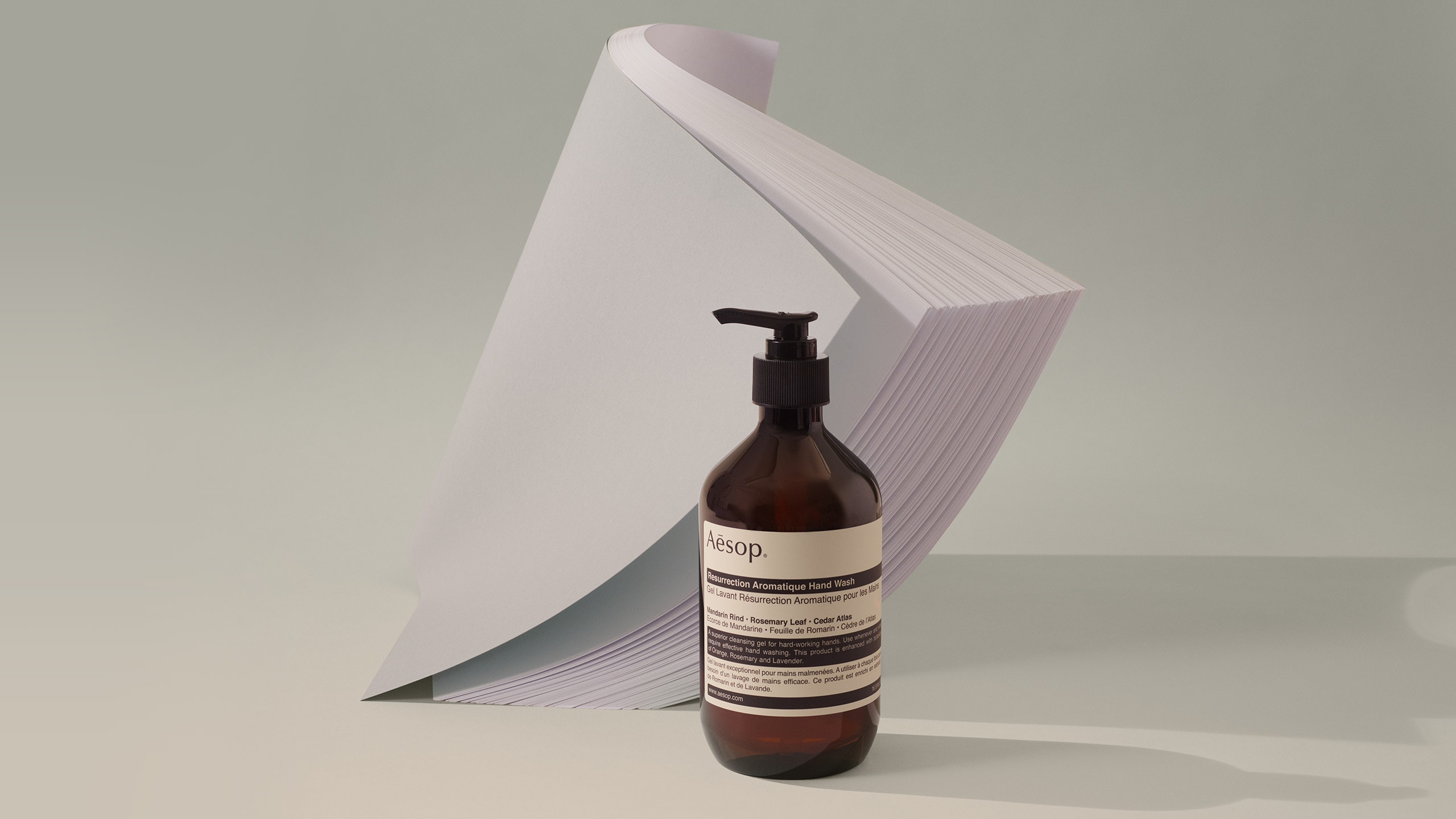 An aesop hand-balm with paper background 