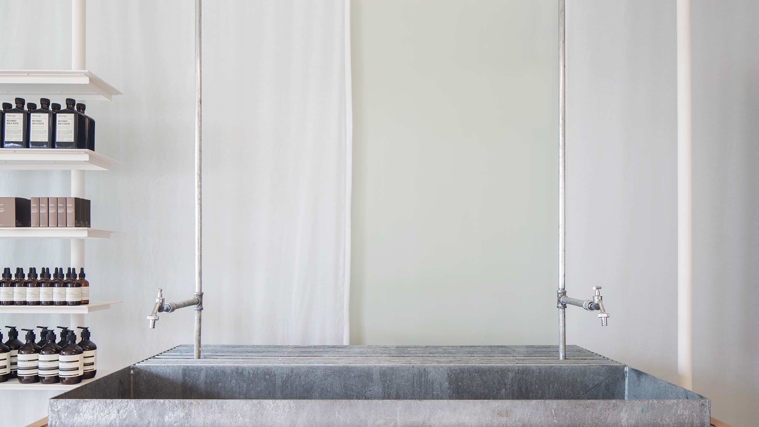 A close-up look at the large metal basin in Aesop Montrose