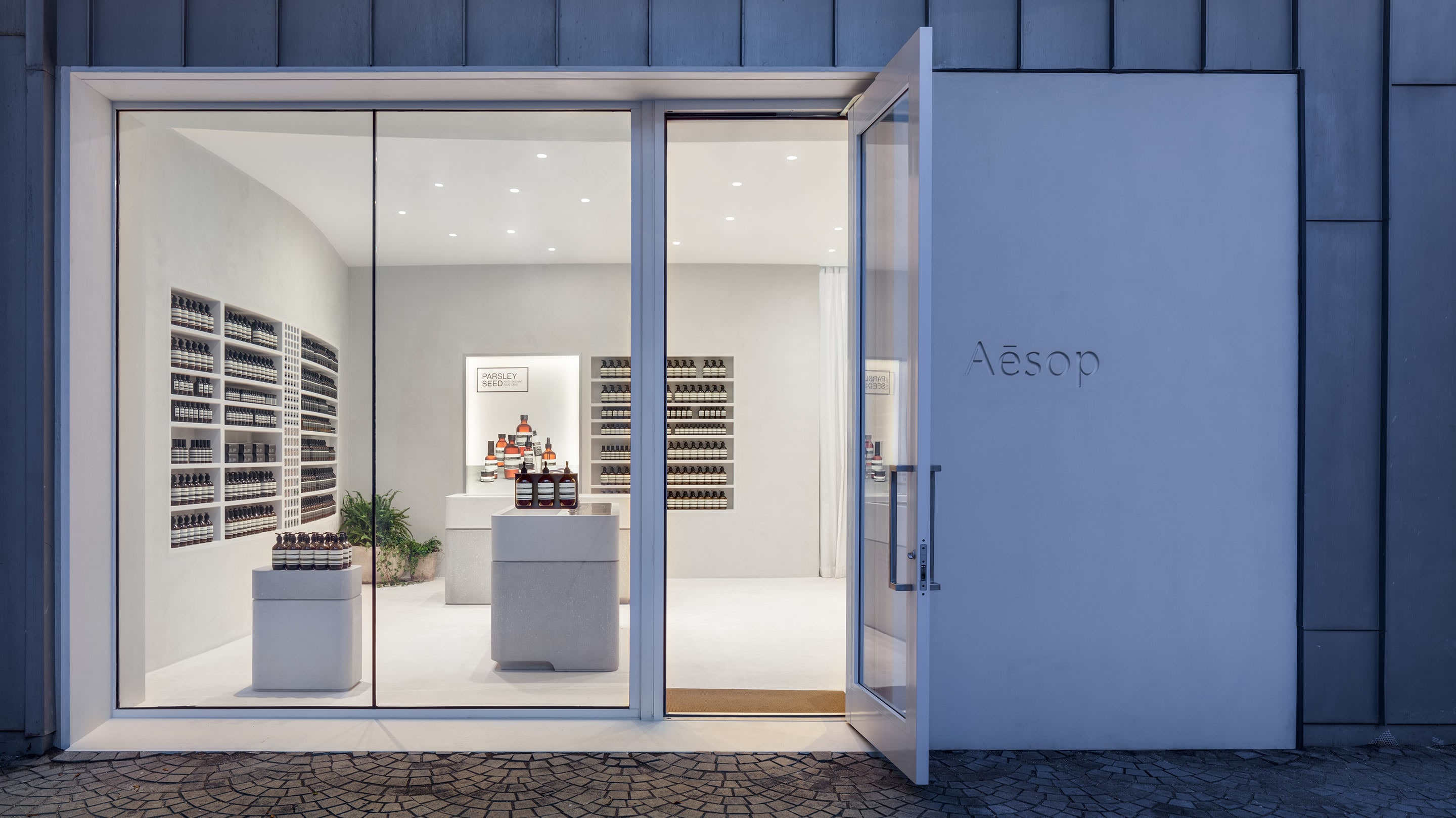 Street view of store entrance to Aesop Design District 