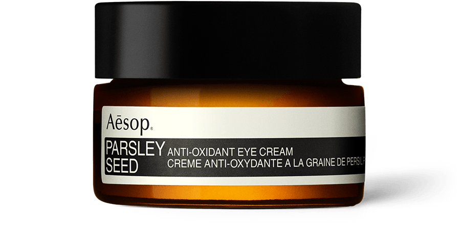 Parsley Seed Anti-Oxidant Eye Cream in einem bernsteinfarbenen Glastiegel mit Drehverschluss. 