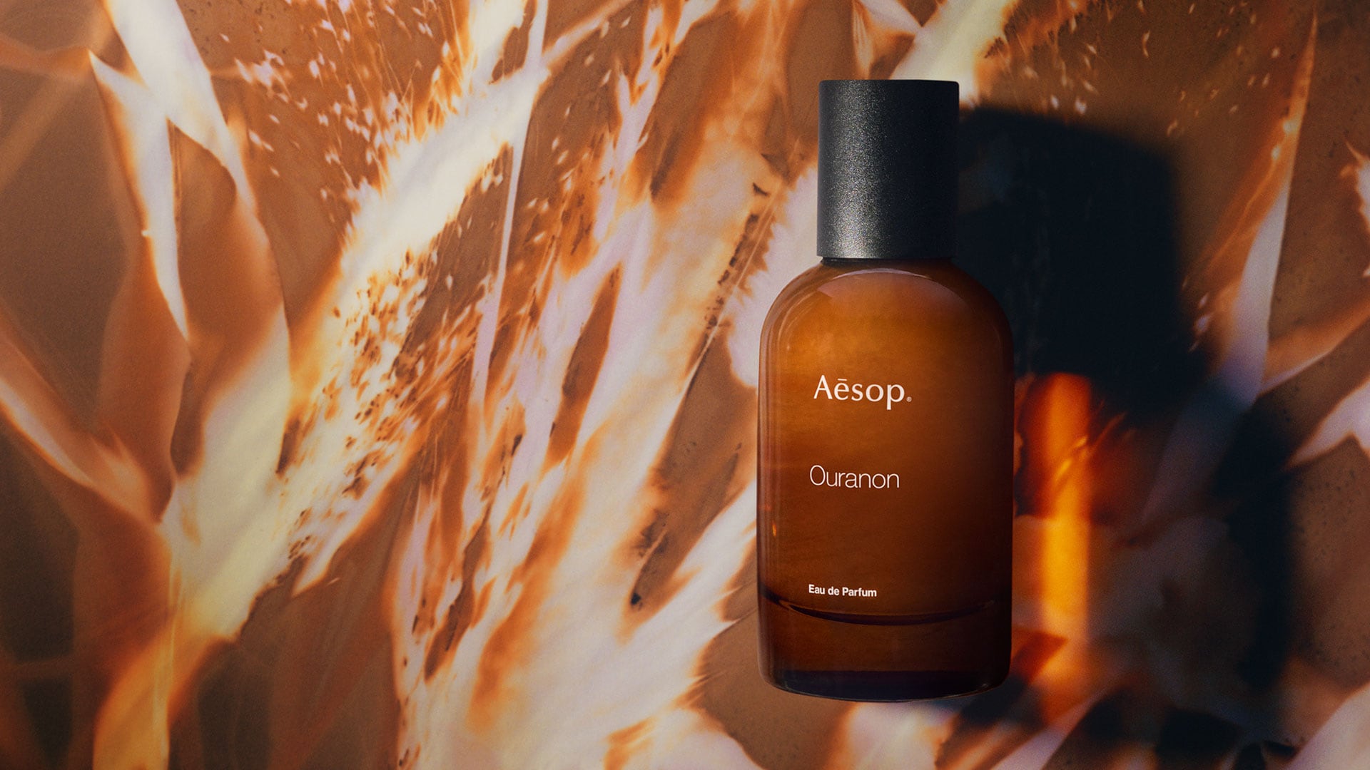 Ouranon Eau de Parfum on an abstract background