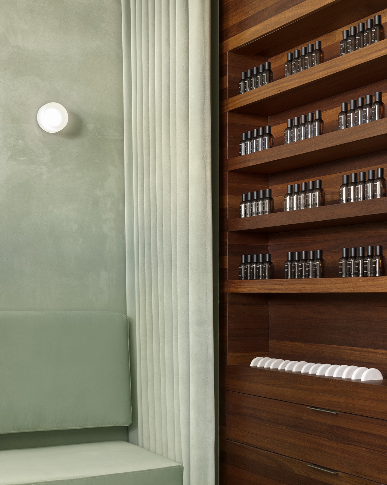 store interior photo featuring shelves with Aesop products