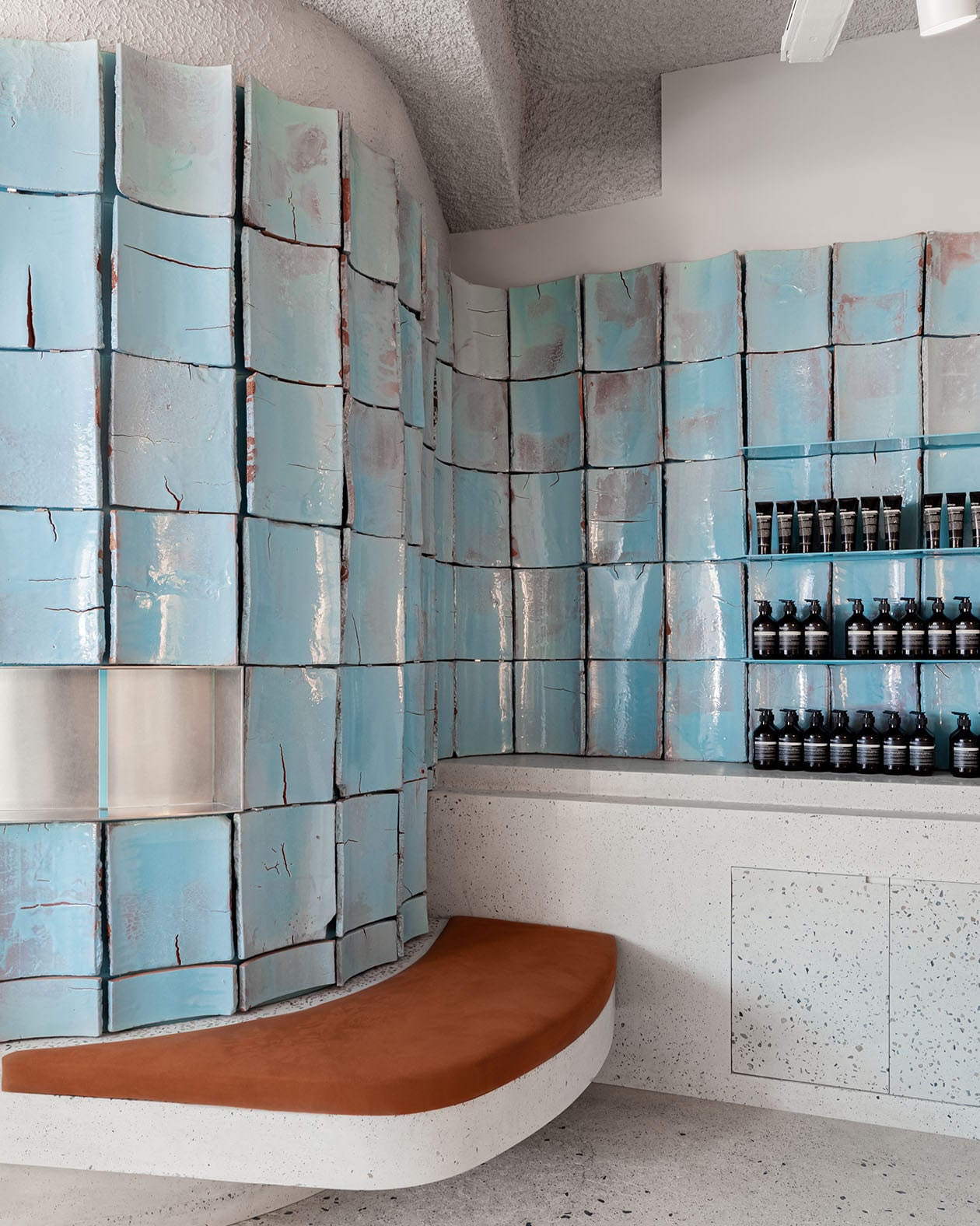 Exhibiting the blue-green reclaimed tiles in the corner