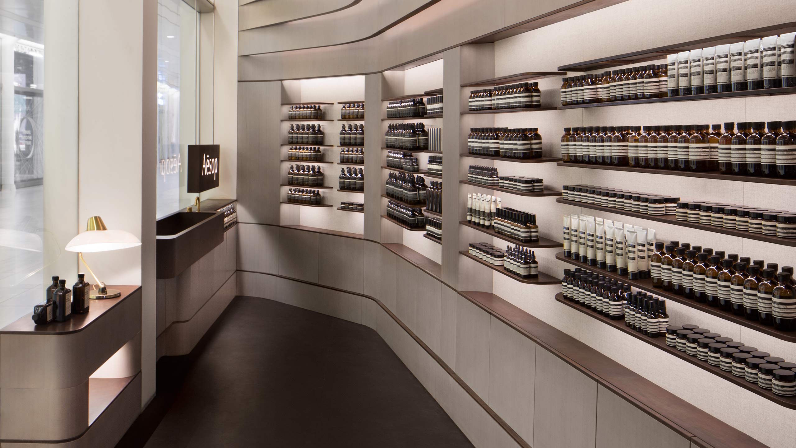 Store details showing muted shades of brown floors and shelving 