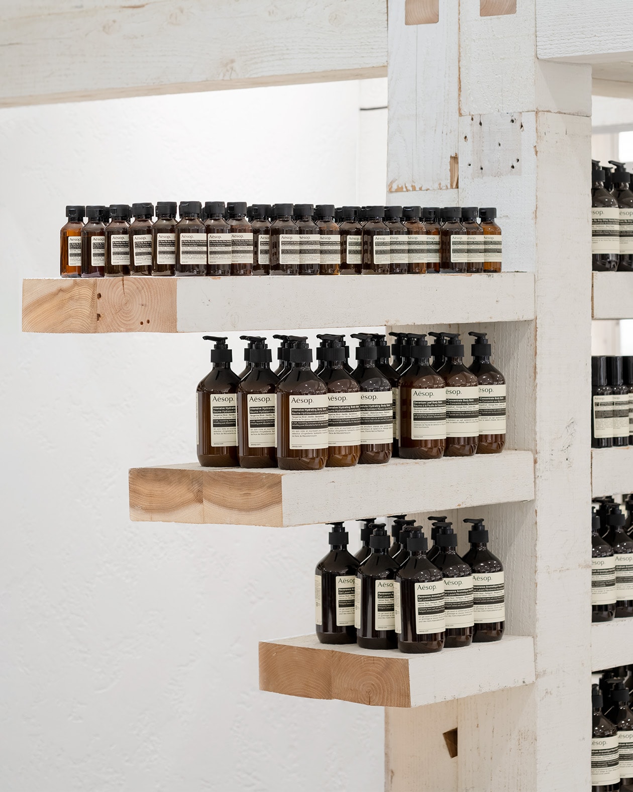 Aesop hankyu umeda 8F Interior, products line up at the store which has the term of 'A modular arrangement of repurposed timber'