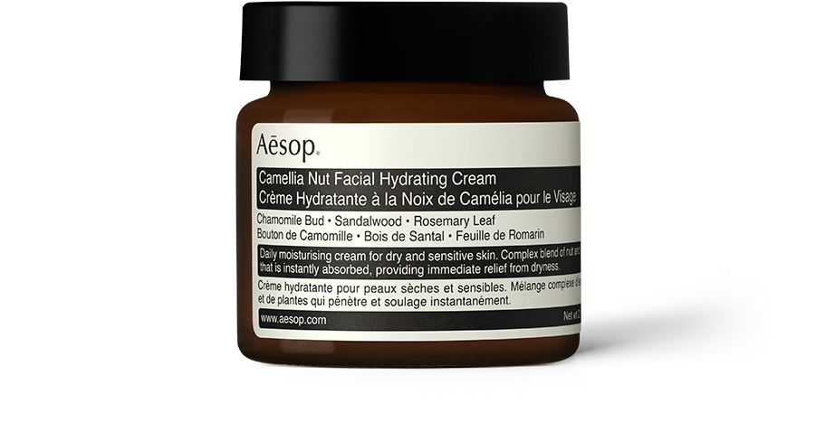 Camellia Nut Facial Hydrating Cream in amber glass jar 