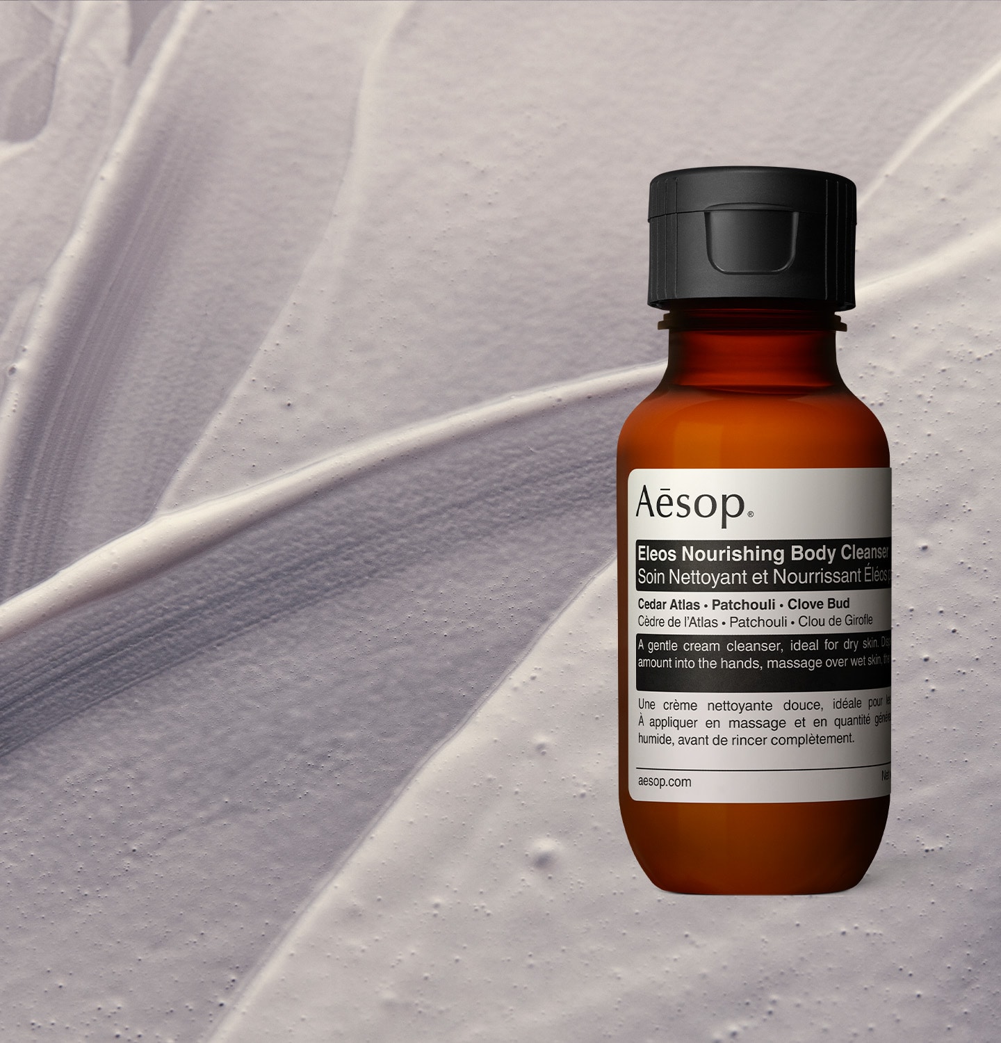 Eleos nourishing body cleanser texture overlay with Eleos nourishing body cleanser deluxe sample