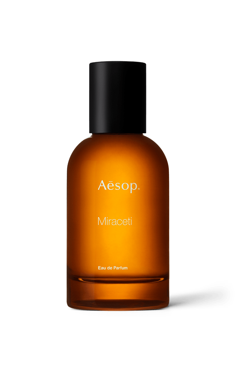 Miraceti Eau de Parfum in an amber bottle.