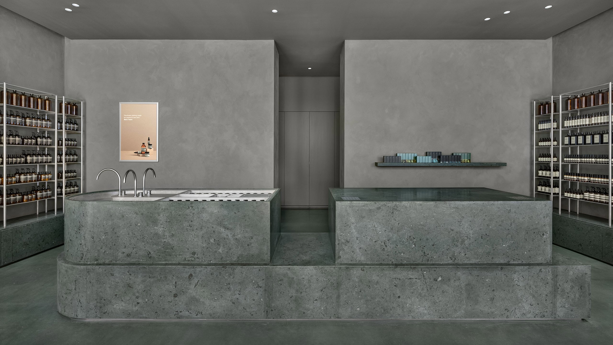The centrepiece of Aesop Chinook Centre, a limestone basin and counter.