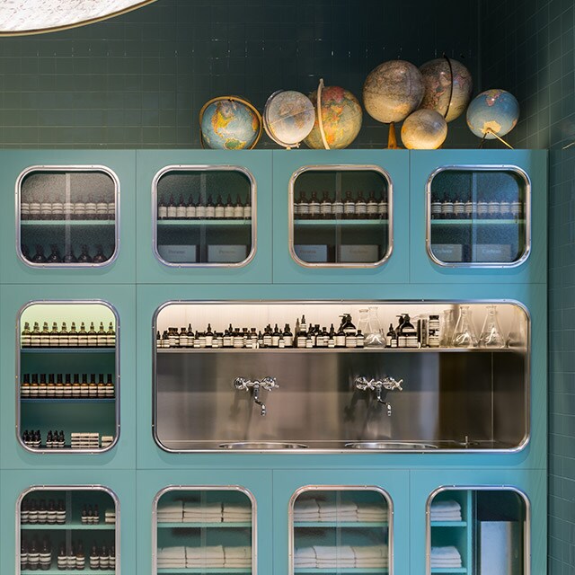Aesop Corso Magenta store interior shelving