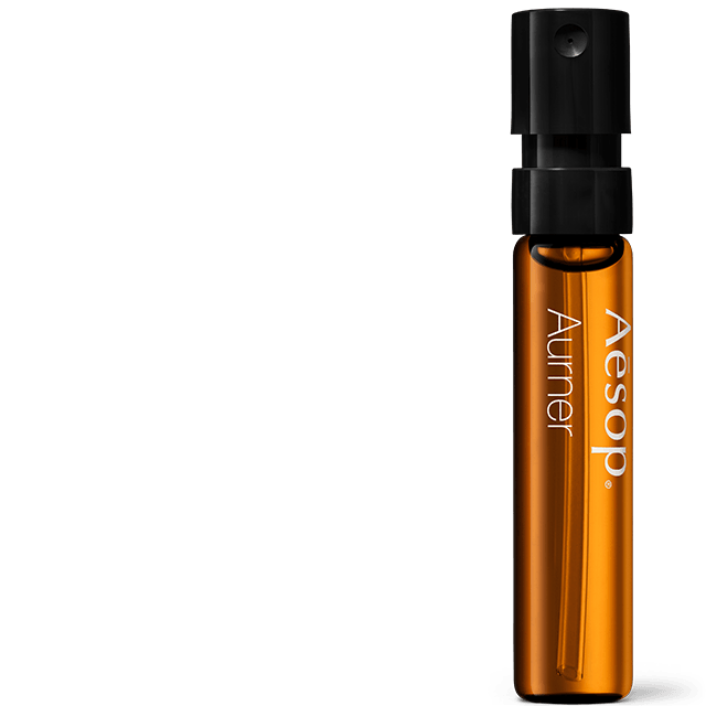 Aurner Eau de Parfum in an amber vial