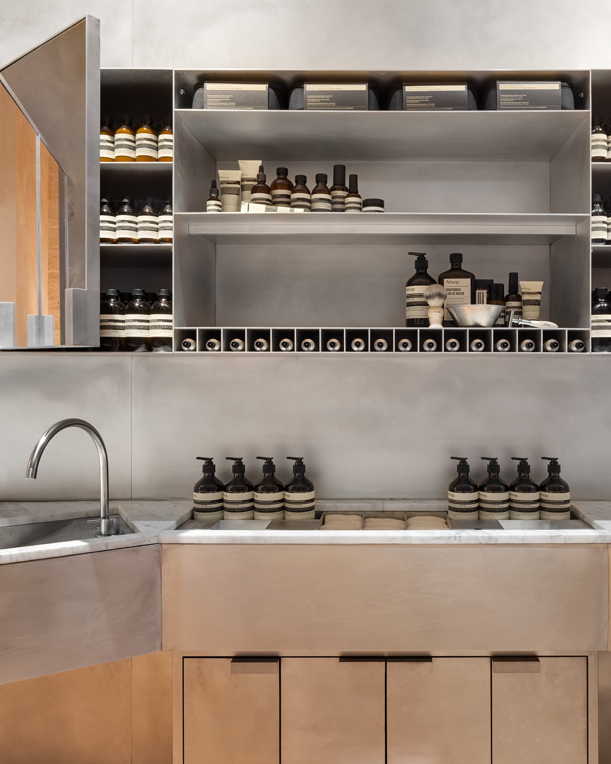aesop nolita basin with shelves and product