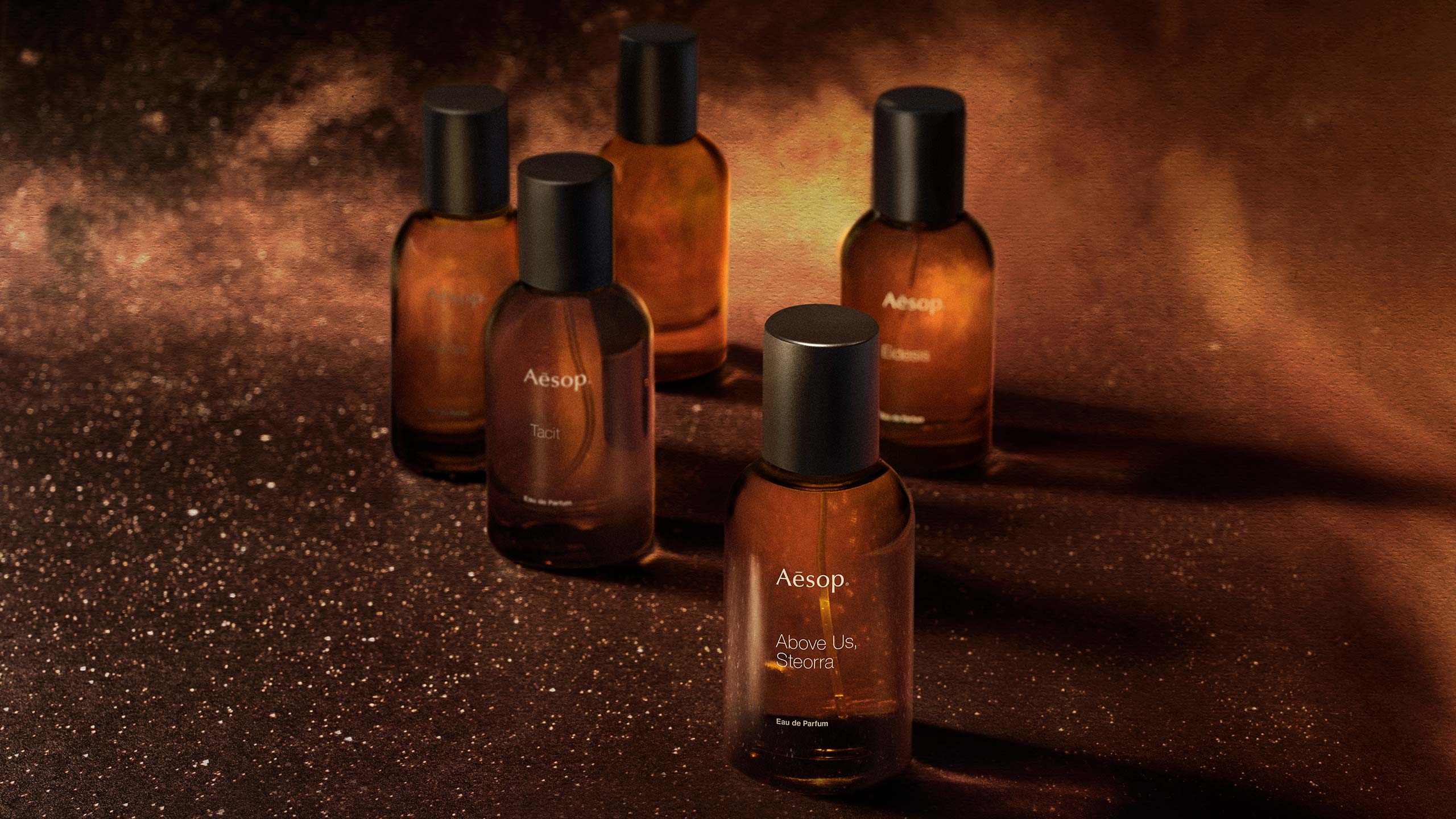 Aesop fragrance bottles placed behind ambient background