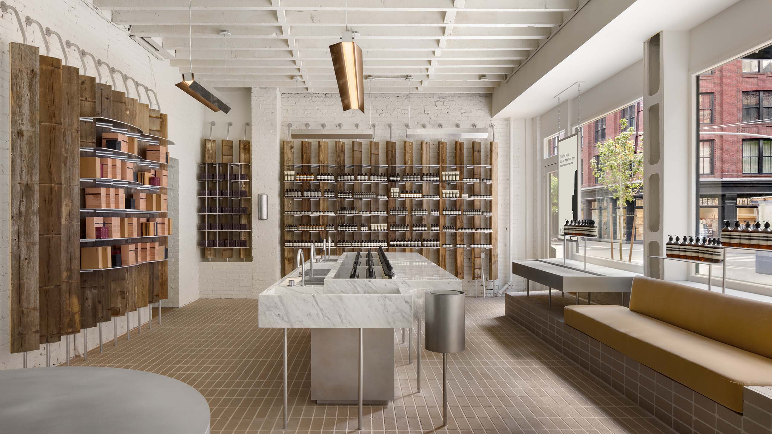 aesop nolita store interior featuring central basin and counter