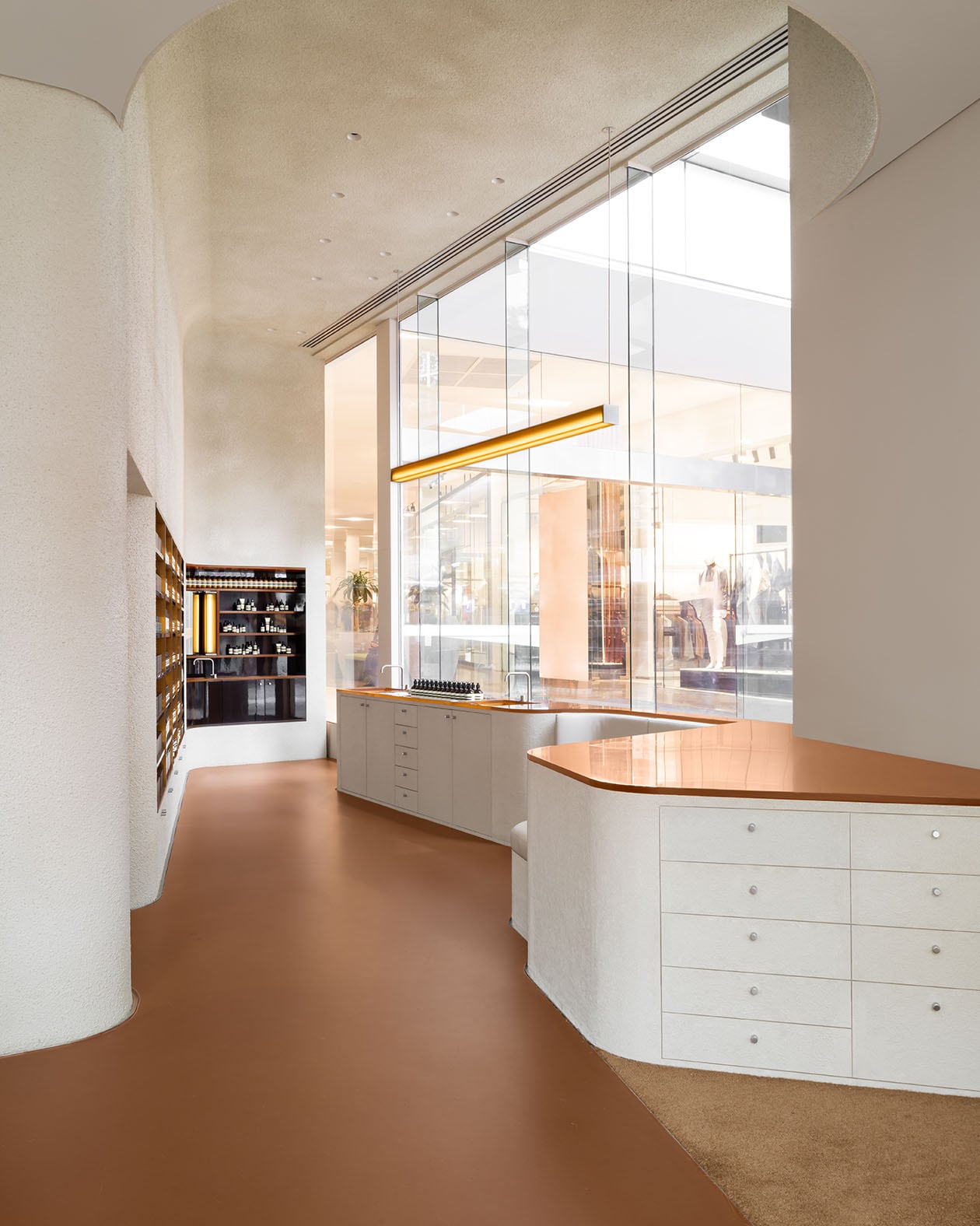 Aesop Perth City store interior with brown floor and wooden bench tops