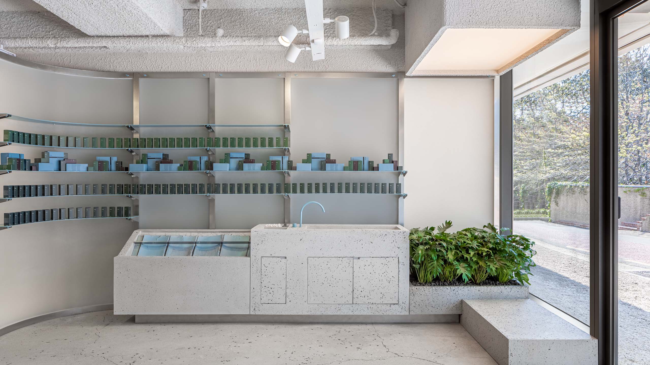 Busan store interior with custom-made terrazzo used as the massive counters and basin