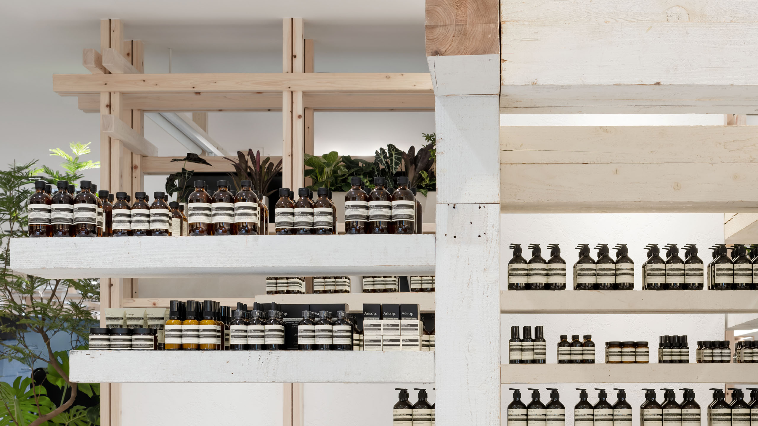 Aesop hankyu umeda 8F Interior, products line up at the store which has the term of 'A modular arrangement of repurposed timber'