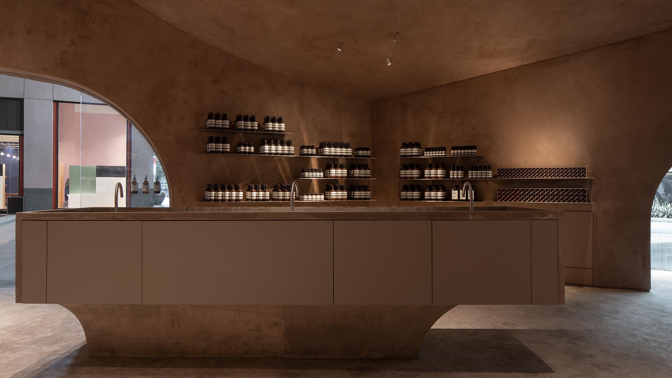 A focused look at the central customer service basin crafted out of locally sourced Perlator Royale marble.