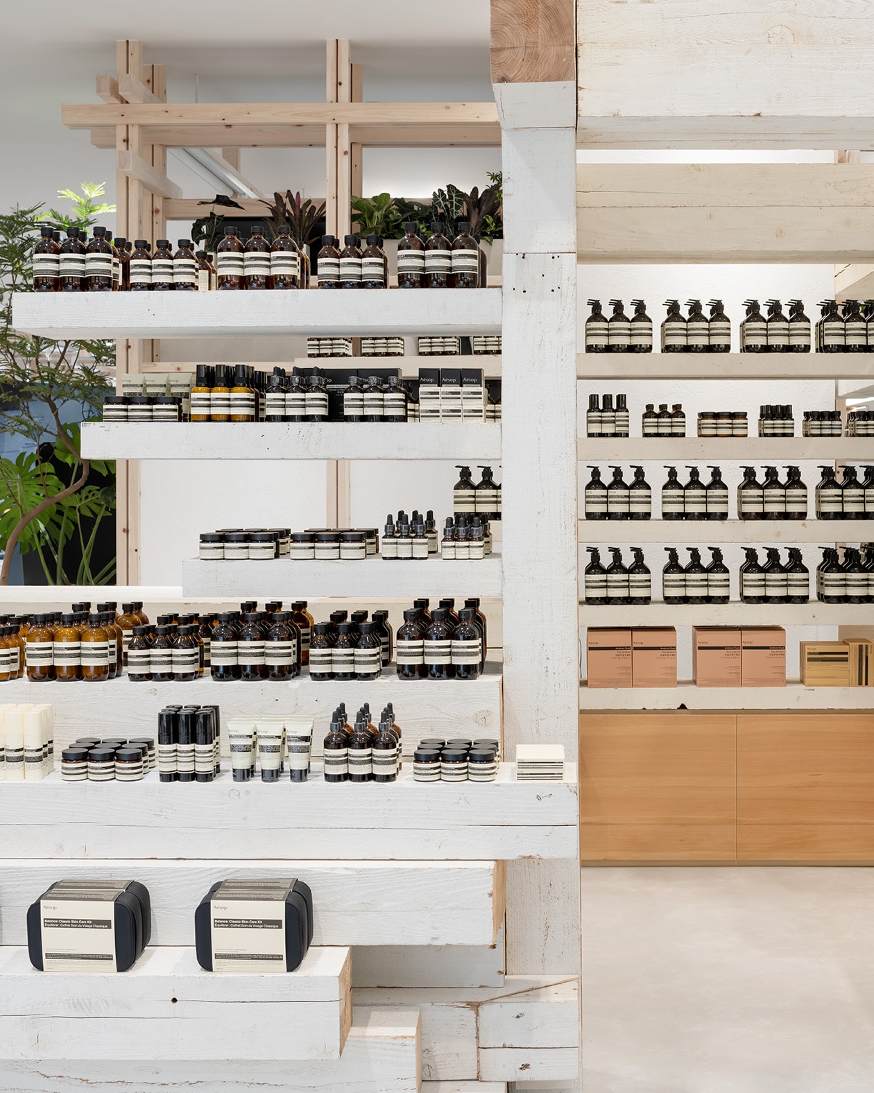 Aesop hankyu umeda 8F Interior, products line up at the store which has the term of 'A modular arrangement of repurposed timber'