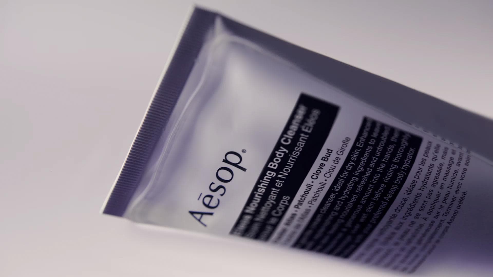 Eleos nourishing body cleanser in purple tube