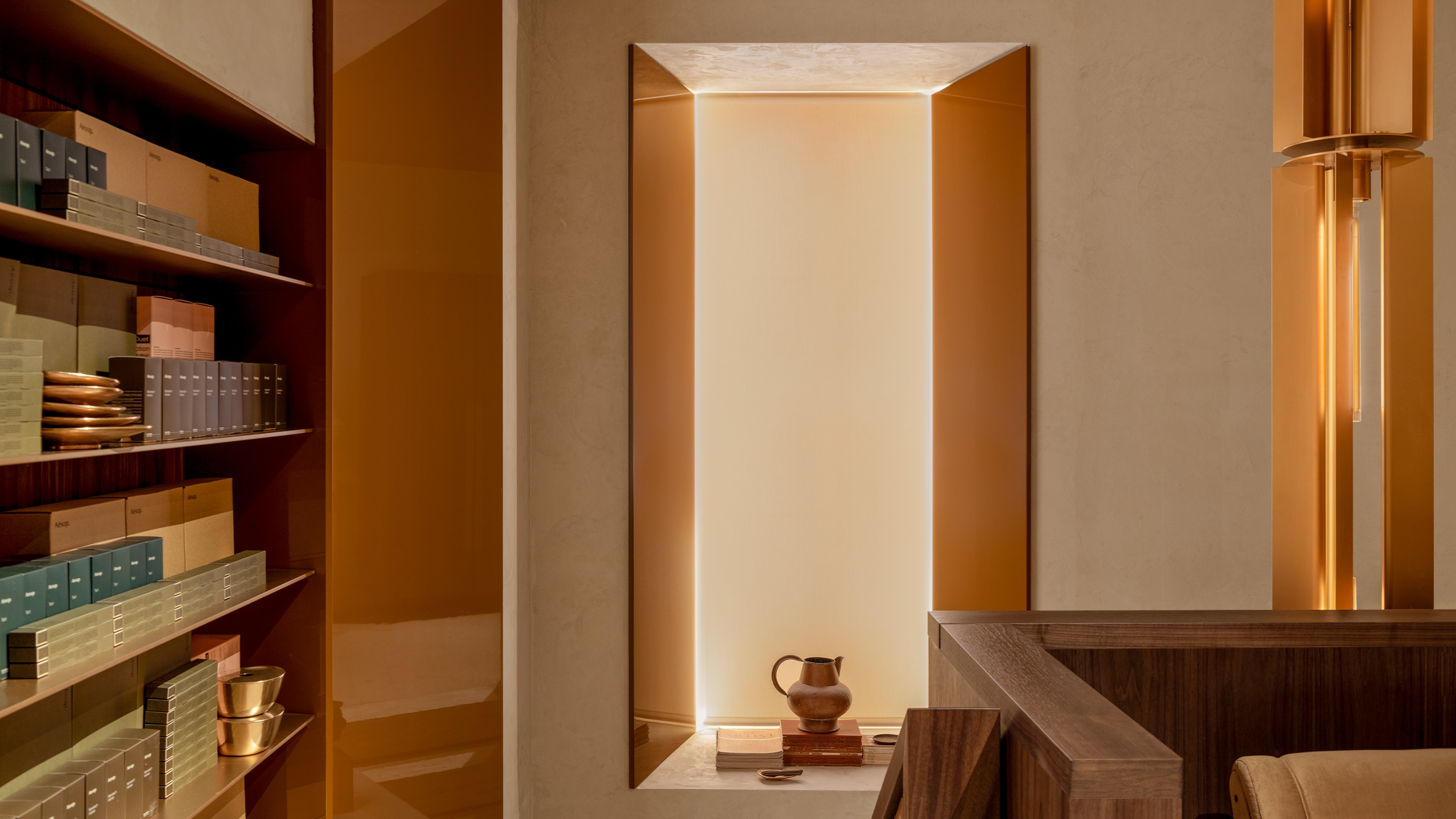 Aesop Via del Corso store interior featuring light display, sculpture and home category products.