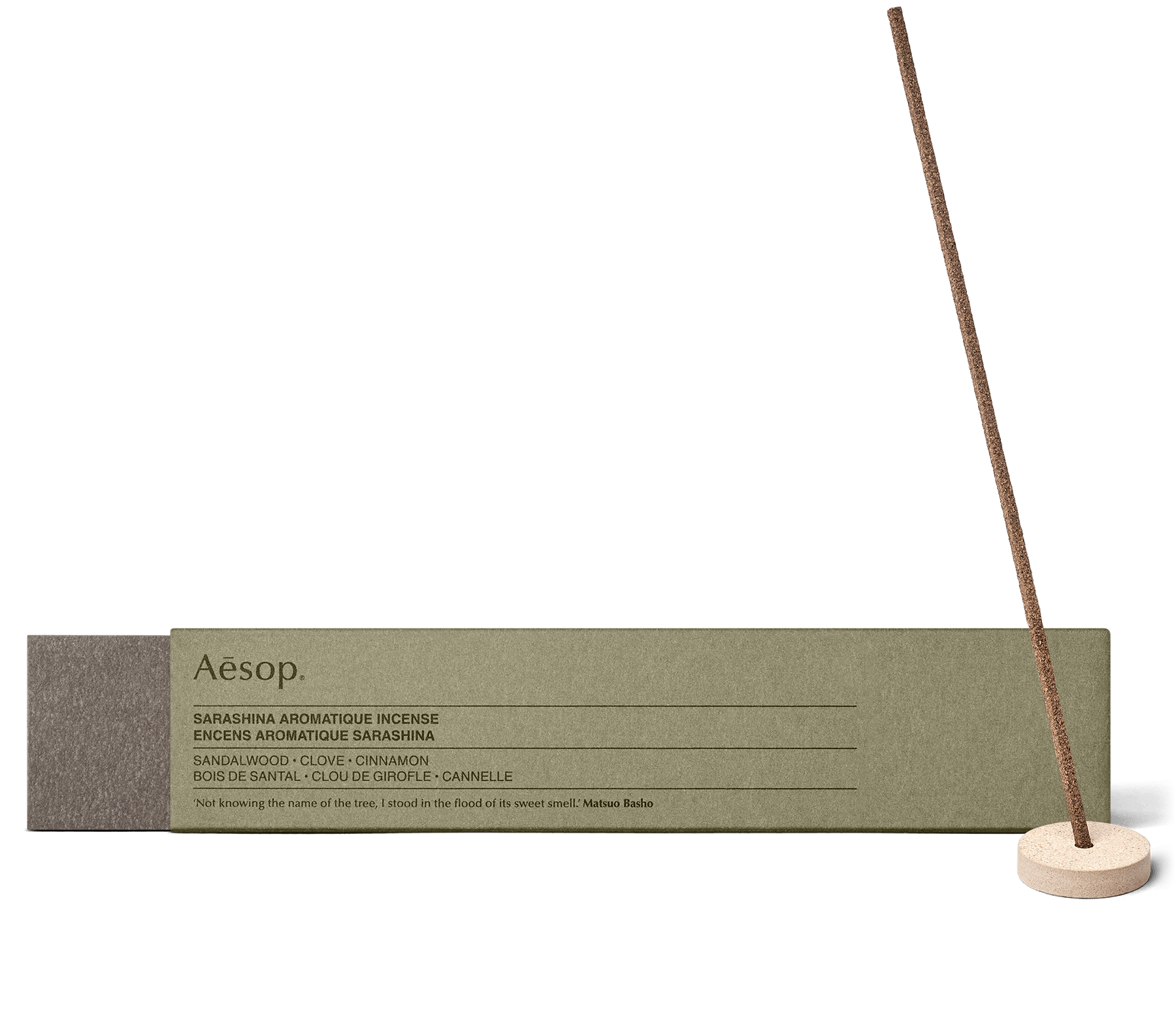 A stick of Sarashina Aromatique Incense in the Kanuma pumice holder, alongside carton packaging. 